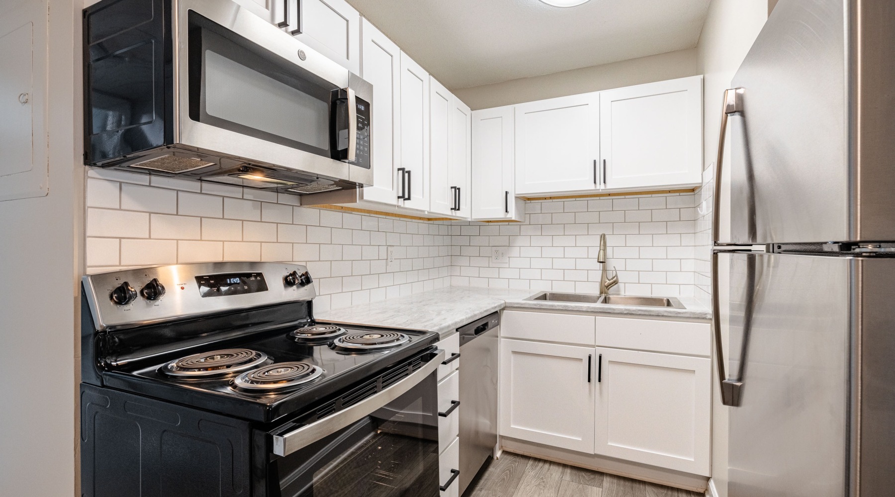 Kitchen with fridge and stove