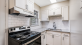 Kitchen with designer finishes and white cabinets