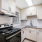 Kitchen with designer finishes and white cabinets