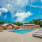 Swimming Pool with brick building backdrop