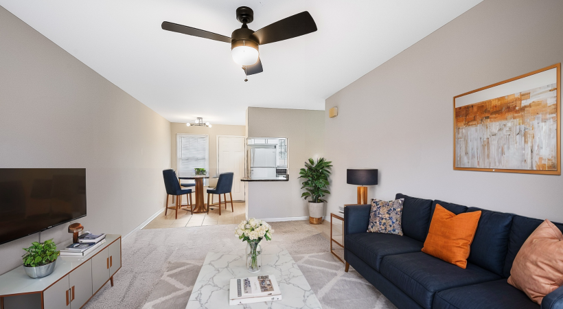 Living Room with couch, coffee table and chairs