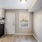 Room near kitchen with stove in view