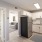 a kitchen with white cabinets